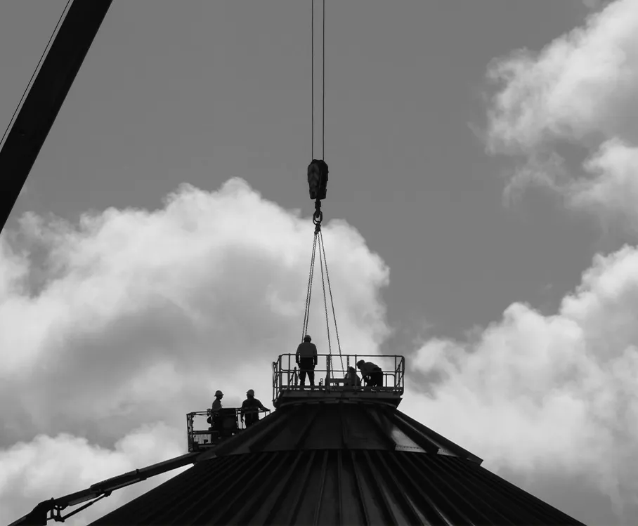 Students positioned on top of a training structure while a crane lifts equipment above them Perth WA
